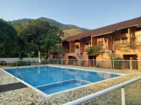 APARTAMENTO COMPLETO na PRAIA com PISCINA, CHURRASQUEIRA, INTERNET E TV A CABO, PLAYGROND, QUADRA e ESTACIONAMENTO
